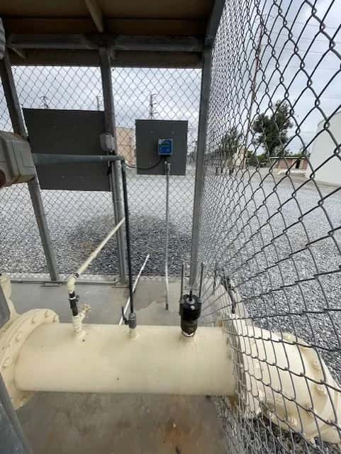 Lakewood wet-tap sensor and controller at the well site pictured in its MP5 report