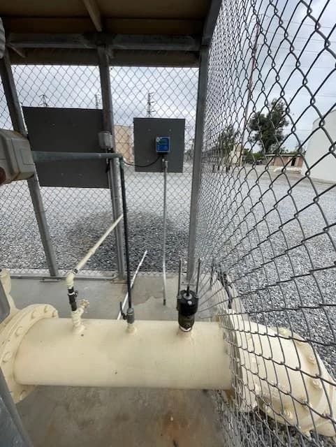 Lakewood wet-tap sensor and controller at the well site pictured in its MP5 report