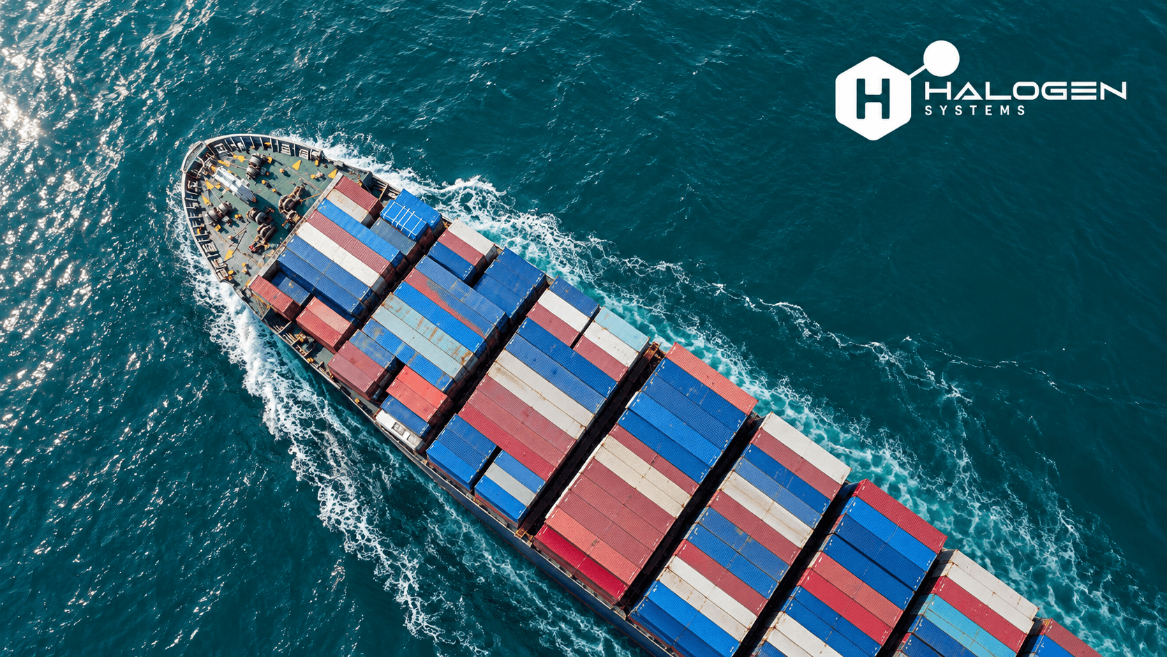 Aerial view of a container ship at sea with the Halogen Systems logo